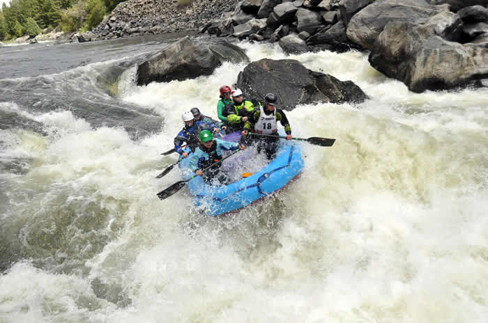 Animas Amazons Race team in Gore Canyon with a custom Jack's Plastic Welding inc self bailing whitewater raft